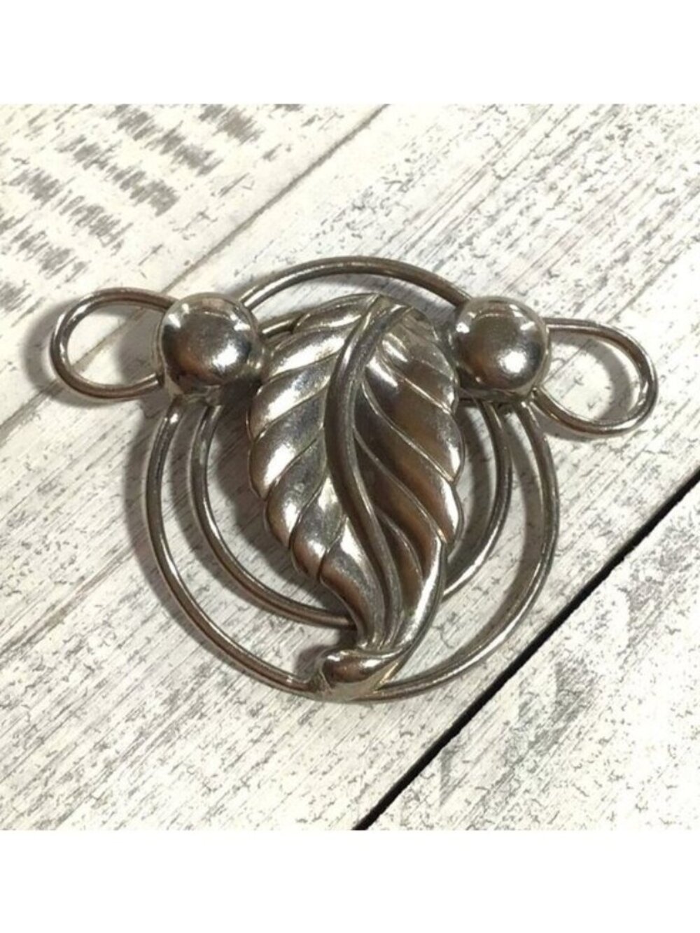 Vintage Silver-Tone Leaf Brooch With Circular Design & Pin Back